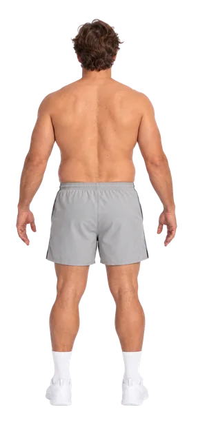 Earlier Proof progress scan: back view of the same man in grey shorts